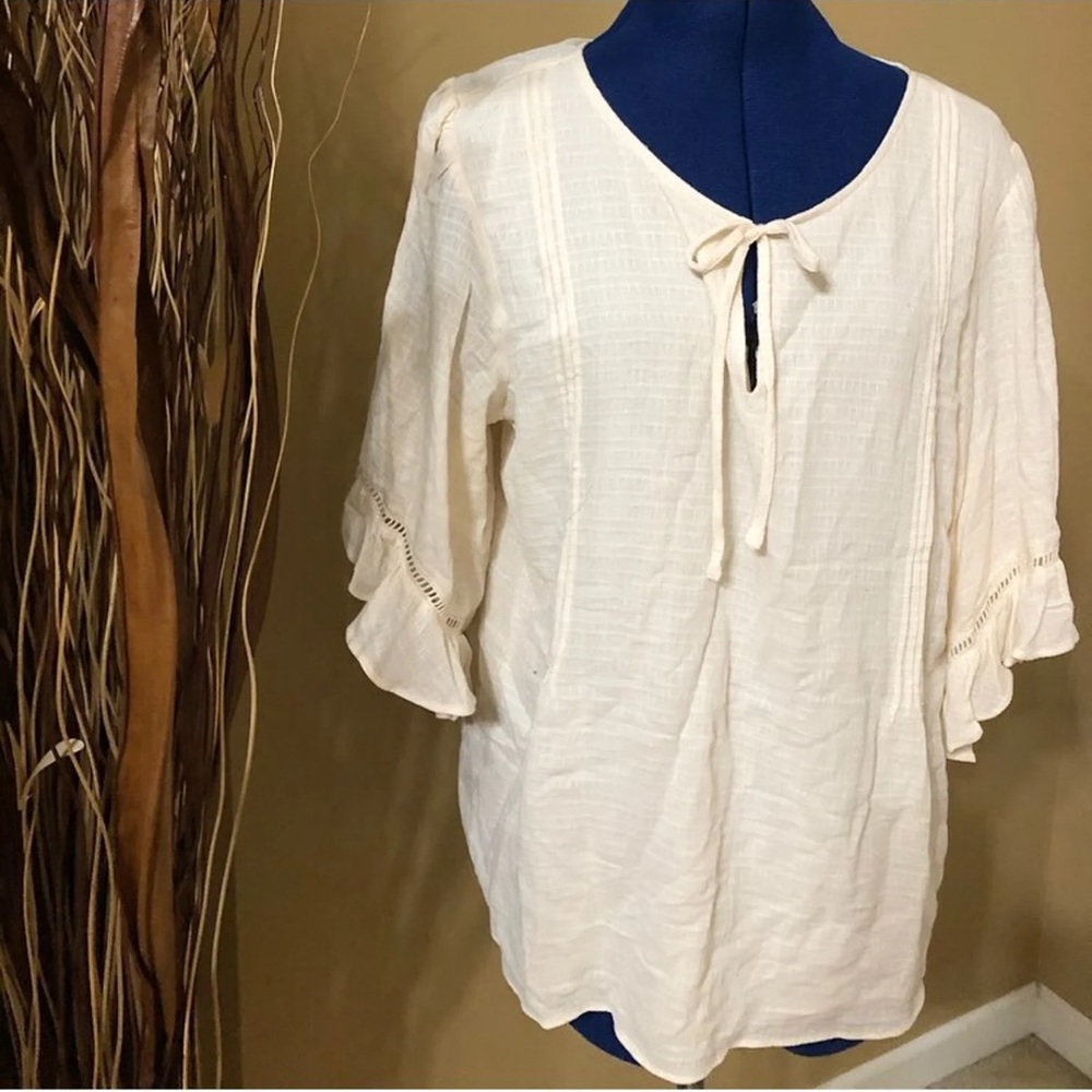 Cream colored light weight top